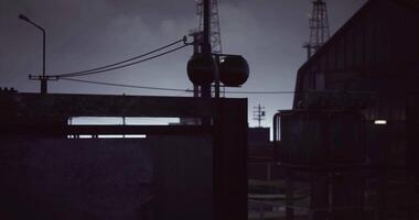 CGI Industrial silhouette during twilight with power lines in the background video