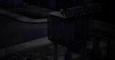 CGI Nighttime urban scene with an industrial transformer on a dark street video