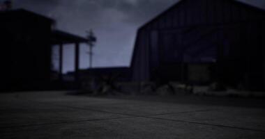 CGI Evening view of a rustic building under cloudy skies near a rural area video