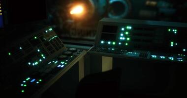 CGI Control room with illuminated panels and dim lighting at a remote facility video