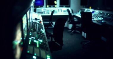 CGI A control room is illuminated with colorful lights from various equipment video