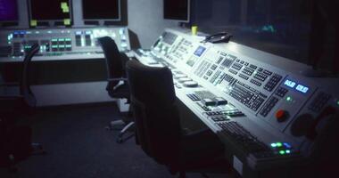 CGI Control room with illuminated equipment in a dim environment at night video