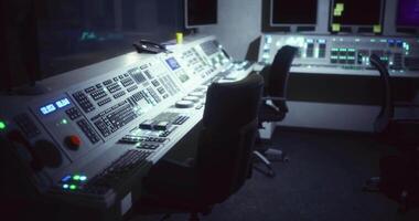 CGI Control room with advanced equipment and dim lighting during late hours video
