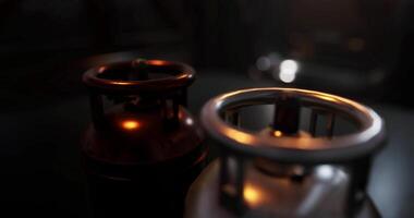 CGI Close up view of two gas canisters showcasing varying colors and textures video