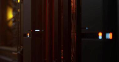 CGI Modern data center illuminated by LED indicators showcasing server activity video