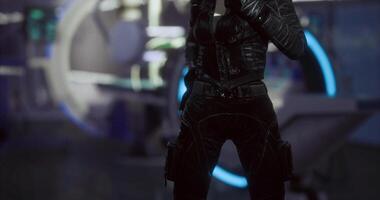 CGI Futuristic character in stylish outfit posing in a high tech environment video