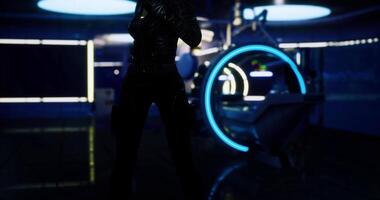 CGI Mysterious figure in futuristic lab setting with neon accents at night video