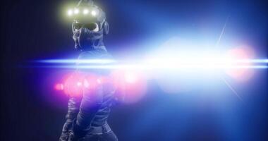 CGI Futuristic character in dark setting with bright light and dramatic focus video