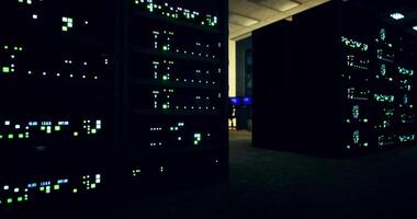 CGI Data center illuminated by server lights during nighttime operations video