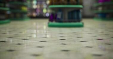 CGI View of a retail store floor with display shelves and colored products video