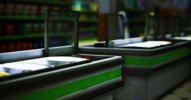 CGI Checkout counters in a grocery store during evening hours video