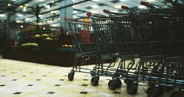 CGI Shopping carts lined up waiting in supermarket during busy afternoon hours video