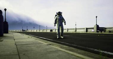 CGI Astronaut explores empty road under cloudy sky during dawn video