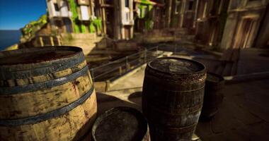 CGI View of rustic barrels near a tranquil body of water in a scenic landscape video