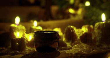 CGI Soft candlelight illuminates a tranquil setting with natural elements video