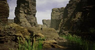 CGI Rocky cliffs surround a tranquil waterway under a cloudy sky at midday video