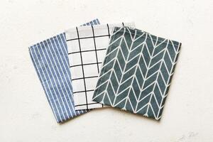 top view with blue kitchen napkin isolated on background. Folded cloth for mockup with copy space, Minimal style photo