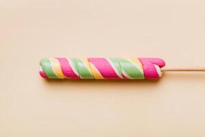 Colorful candies, lollypop -the colorful background, multicolored minimal style top view photo