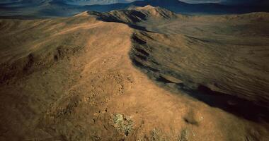 CGI Majestic aerial view of rugged mountain terrain with dramatic shadows video