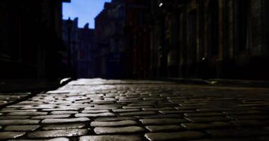 CGI Cobblestone street illuminated by evening light in a historic urban area video