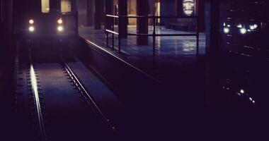 CGI Subway train arriving at a dimly lit station during late evening hours video