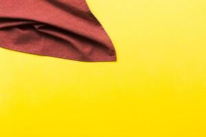 top view red empty kitchen napkin isolated on table background photo