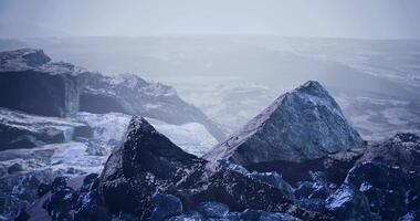 CGI Mysterious rocky landscape with fog and shadows in an otherworldly setting video