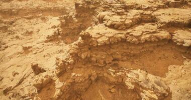 CGI Unique geological formations in a dry desert landscape during midday video