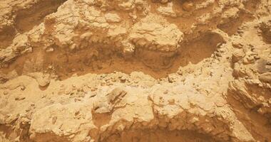 CGI Unique geological formations in a dry desert landscape captured during daylight video