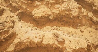 CGI Exploring sandy terrain with rock formations in sunny desert environment video