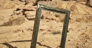 CGI Desert landscape features an ornate frame standing amidst rocky terrain video