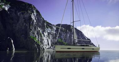 CGI Sailing vessel anchored near stunning rocky cliffs under a clear sky video