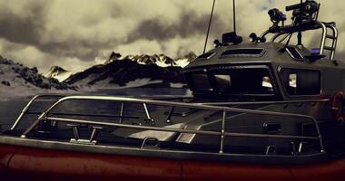 CGI Rescue boat preparing for action in rugged coastal landscape under cloudy sky video