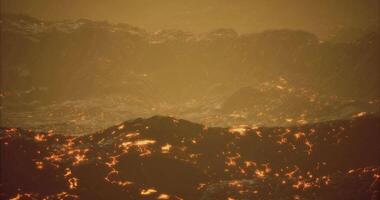 CGI Lava flows and volcanic landscape at sunset create an otherworldly atmosphere video