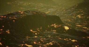 CGI Lava flow shines with embers on rugged volcanic terrain video