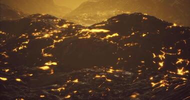 CGI Magma flows illuminate volcanic landscape during sunset in remote region video