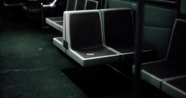 CGI Subway train interior with empty seats in a dimly lit environment video
