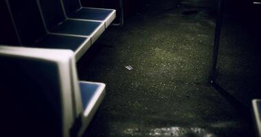 CGI Empty subway train interior with blue seats and dark atmosphere video