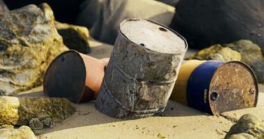 CGI Rusty barrels on sandy beach surrounded by rocks and ocean waves video