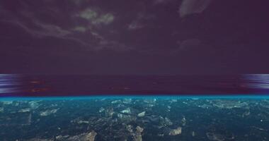 CGI Nighttime ocean view with calm waters and dark sky reflecting light video
