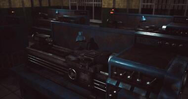 CGI Industrial workshop with machinery illuminated by soft blue lights video