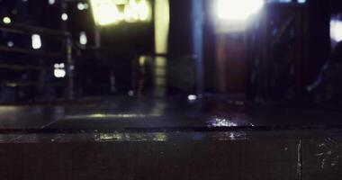 CGI Reflections of light on a wet surface in an urban setting at night video