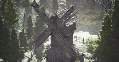 CGI Historic wooden windmill stands amidst lush greenery in a tranquil setting video