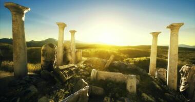 CGI Ruins of ancient columns under a bright sunrise in a lush valley video