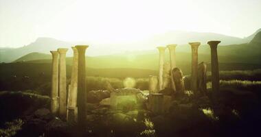 CGI Ancient columns illuminated by sunset in a serene landscape video