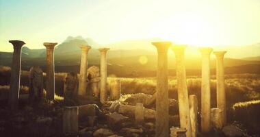 CGI Ancient columns basking in sunlight at a historic site during sunset video