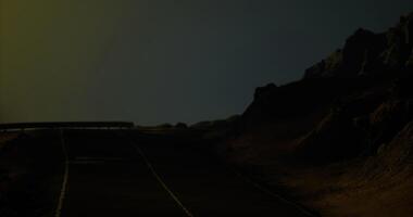 CGI Road leading into the night with rocky terrain and dim lighting video
