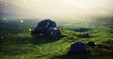 CGI Golden lights sparkle over tranquil rocks in a serene landscape at dusk video