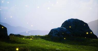 CGI Magical landscape with glowing lights surrounding large rocks at dusk video