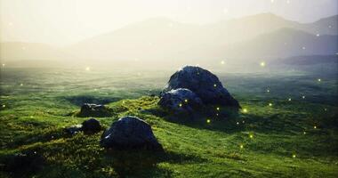 CGI Mysterious landscape with glowing orbs illuminating rocky terrain at dusk video